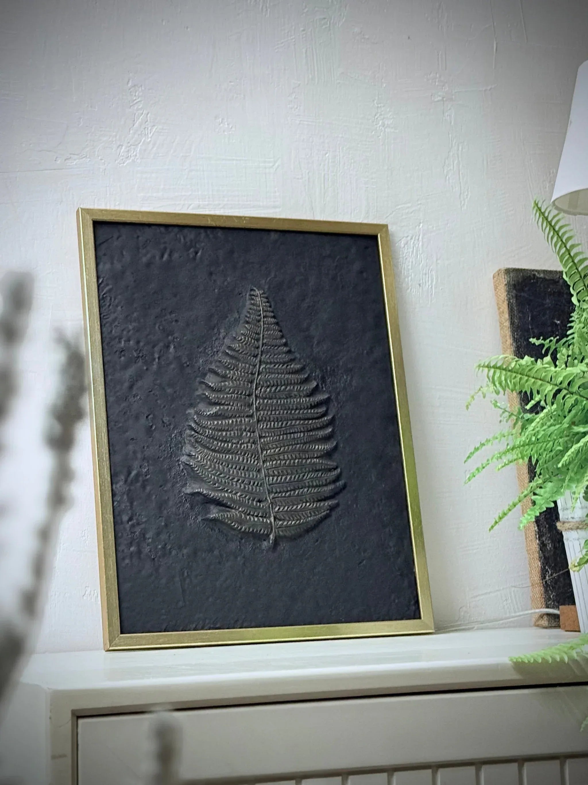 Fern wall decor in a golden frame by DABA Deco, perfect for interior design